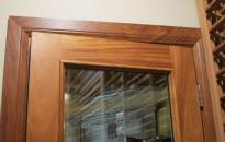 Barolo Glass Wine Cellar Door with Wheat Stain and Lacquer on Sapele Mahogany