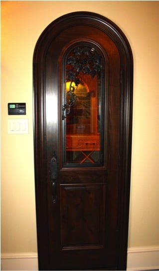 4. Custom Grapevine Carved Door in Colleyville, Texas Wine Room